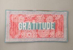 Quilted "gratitude" wall hanging