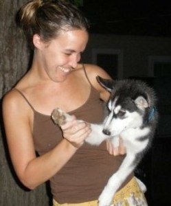woman with husky puppy